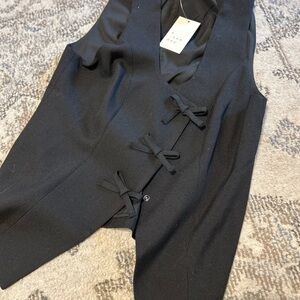 A new day bow vest top